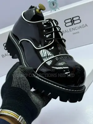 Balenciaga Men's Black Leather Shoes with White Stitching - Boxed