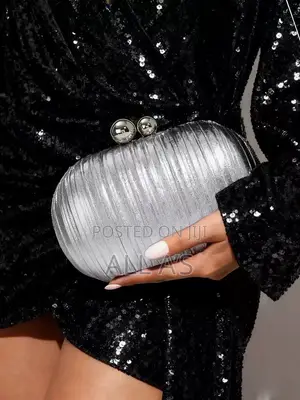 Quchi Metallic Gold Pleated Oval Clutch Bag