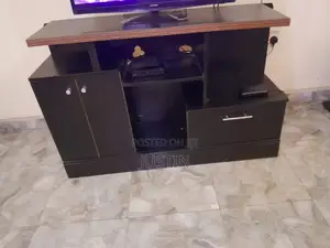 TV Console with Multiple Shelves and Cabinets