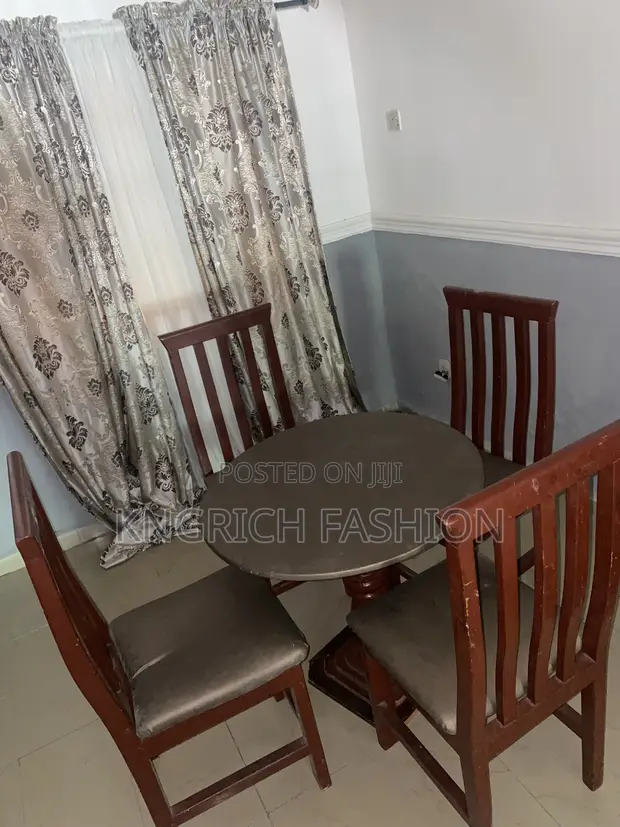 Used 4-Seater Wooden Dining Table with Chairs - 1