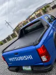 Retractable Roller Boot Cover + TRD Spoiler for Mitsubishi L200 2025 - 1