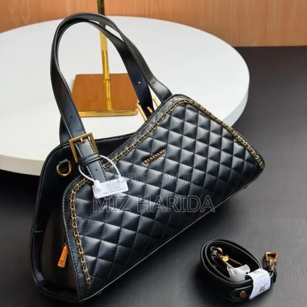 Structured Black Leather Handbag with Gold Hardware - 1