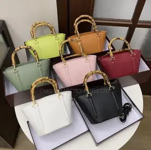 Gucci Jakar Hannu Na Mata Da Hannu