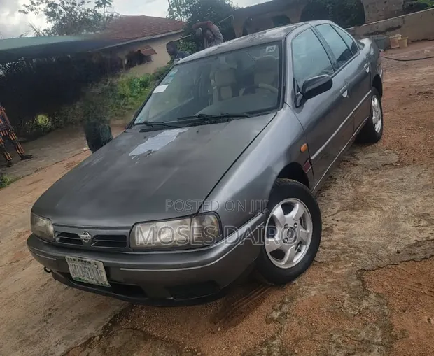 Nissan Primera 1998 Brown - 1