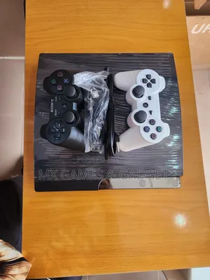 Playstation 3 Slim Amfani da UK Tare da Pad 2 da Wasanni 10