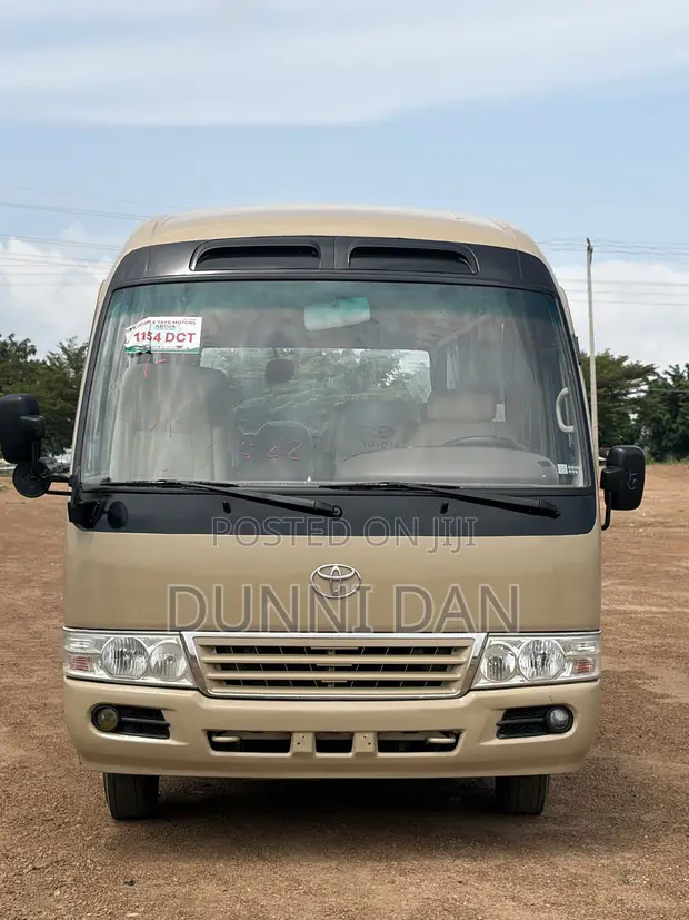 Toyota Coaster 2015 Brown - 1