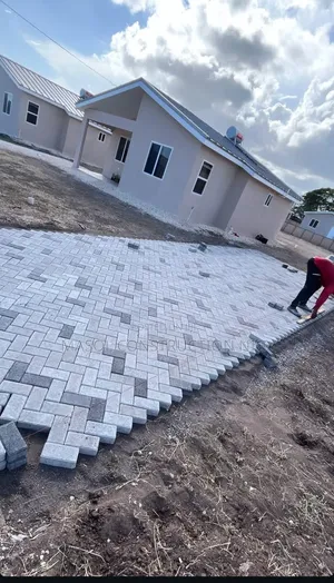 Ingantaccen Shigar Dutsen Interlock don Driveways & Compounds