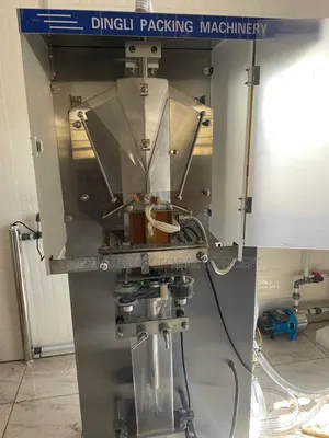 New Dingli Water Bottle Filling and Sealing Machine