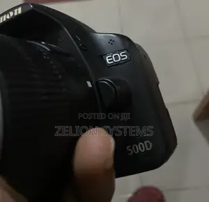 Canon EOS 500D DSLR Camera with 18-55mm Lens & Dummy Battery