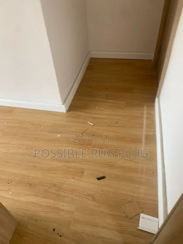 Brand New Beige Vinyl Flooring - 1