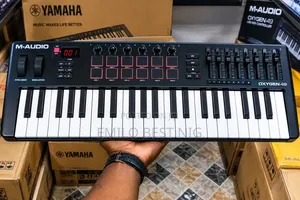 Oxygen 49 Keys MIDI Keyboard Controller with Drum Pad