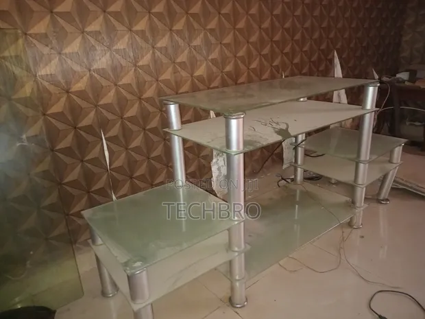 Used Glass TV Stand - 1