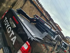 Manual Rolling Boot Cover tare da Off-Road Double Bar don Toyota Hilux