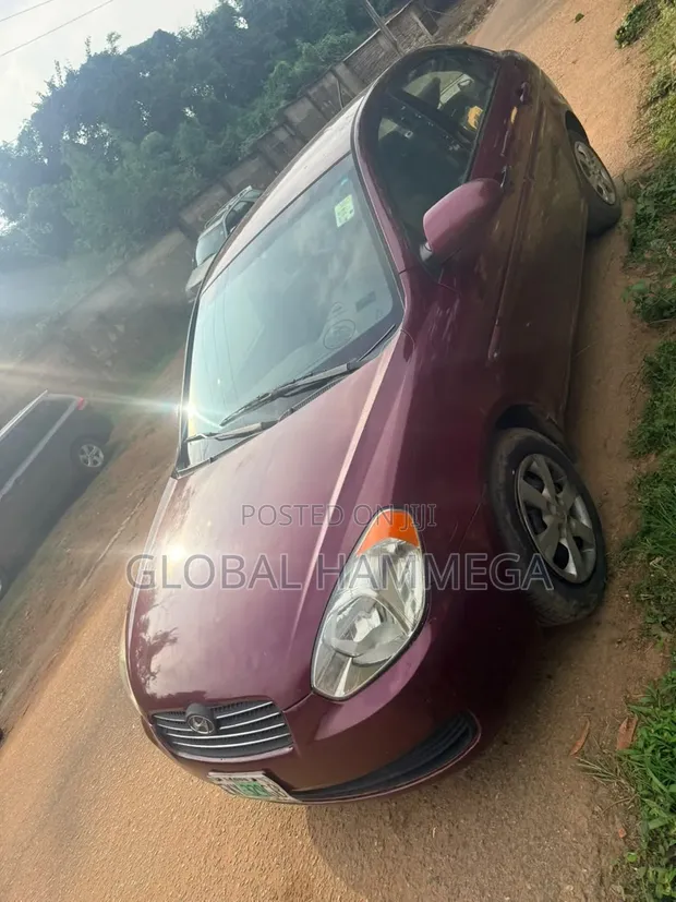 Hyundai Accent 2009 Red - 1