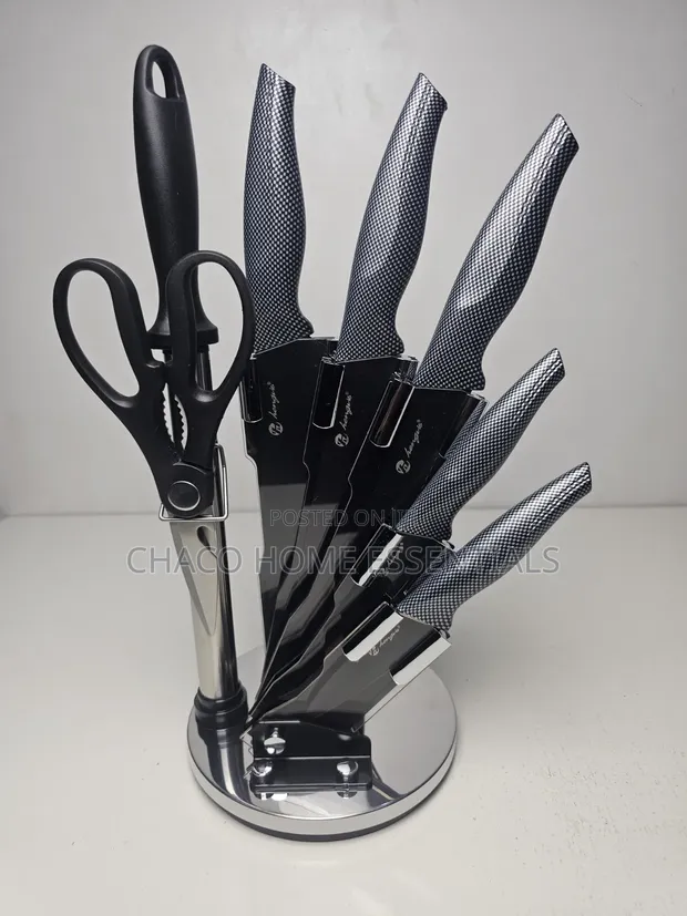 8-Piece Stainless Steel Kitchen Knife Set with Acrylic Stand - 1