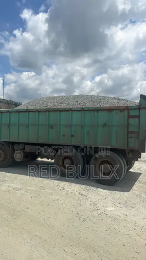 MAN Diesel Truck with Green Bucket