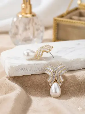 Elegant Crystal Bow Pearl Drop Earrings - Gold Tone