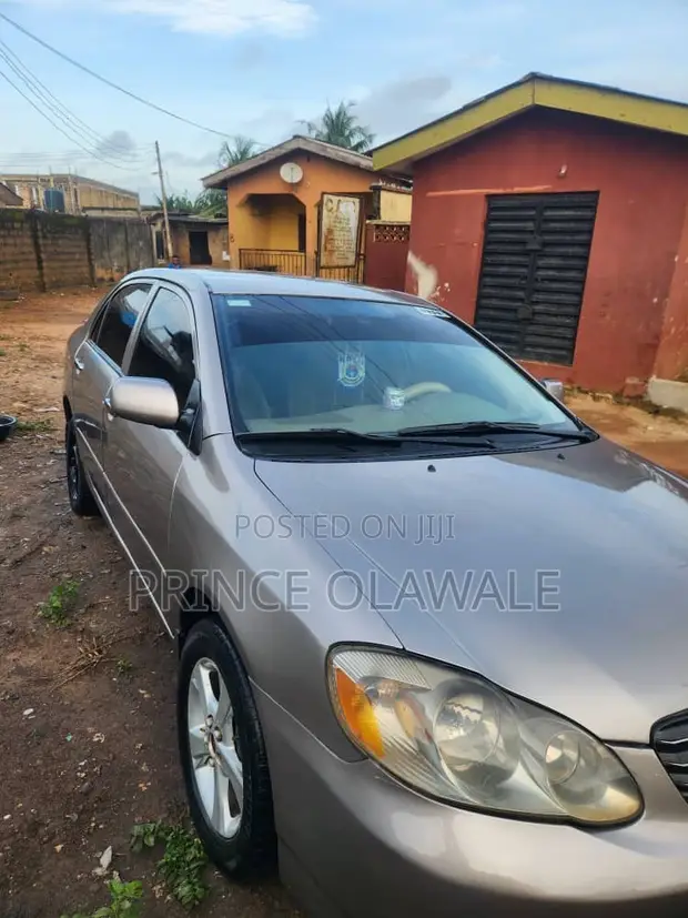 Toyota Corolla 2003 Gold - 1