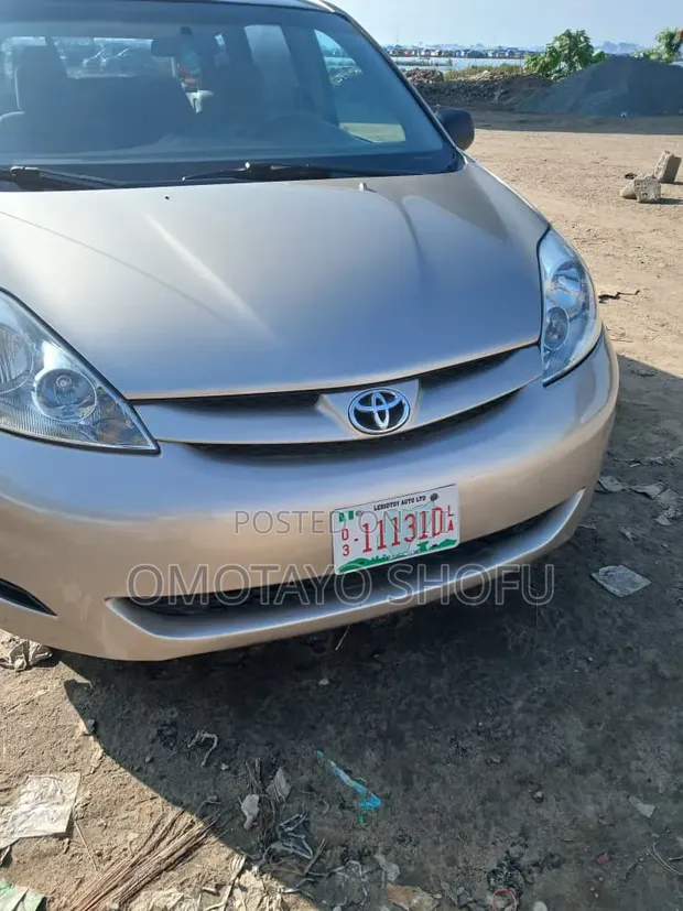 2008 Toyota Sienna CE FWD Minivan - Gold - 1