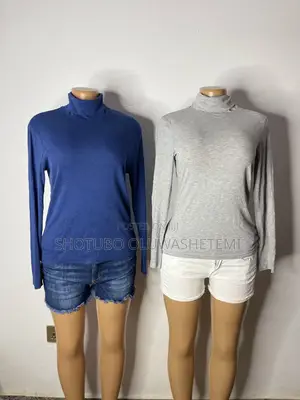 Used Akube Unisex Tops