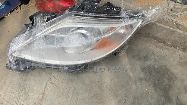 Mazda CX-9 2010 Headlight Replacement - 1
