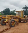 Caterpillar 14E Motor Grader - An Waje Aka Yi Amfani Da Shi - 1