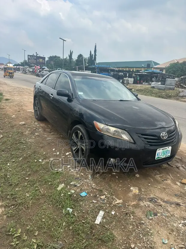 Toyota Camry 2008 Baƙar Fata - 1