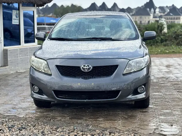 2010 Toyota Corolla LE Sedan - Gray - 1