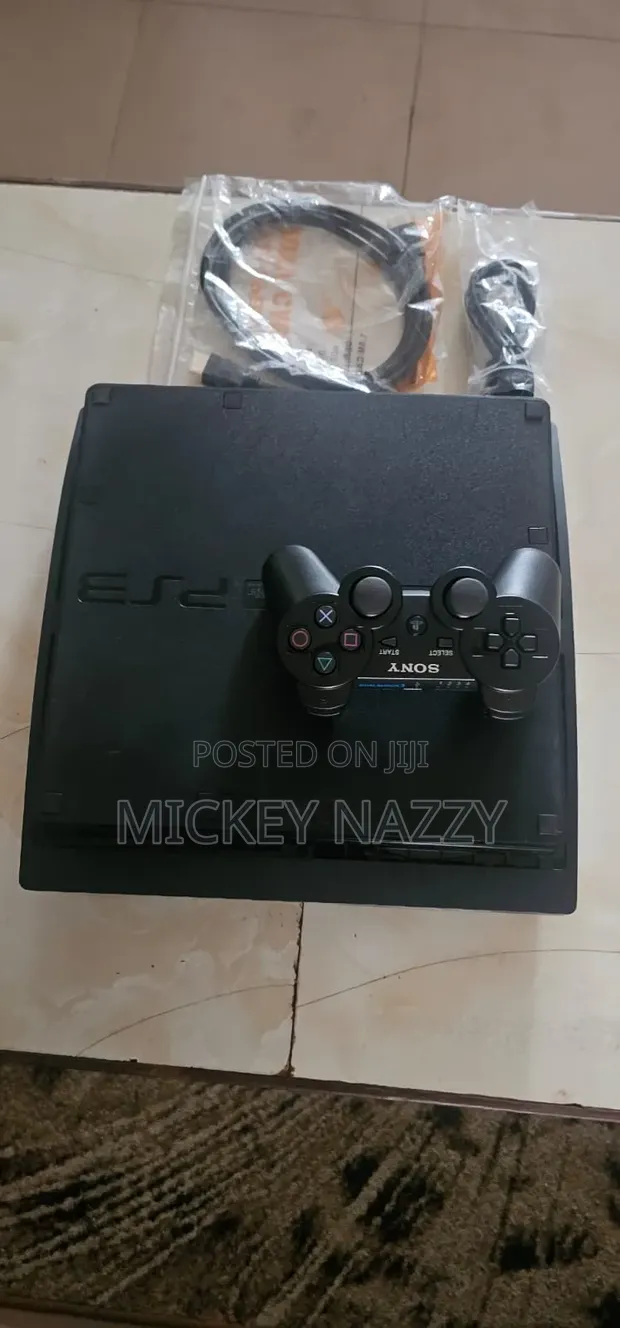 Playstation 3 Slim with Controller and 5 Games - 1