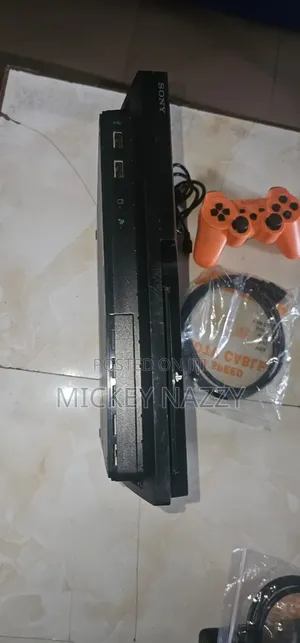 Playstation 3 Slim with Controller and 5 Games