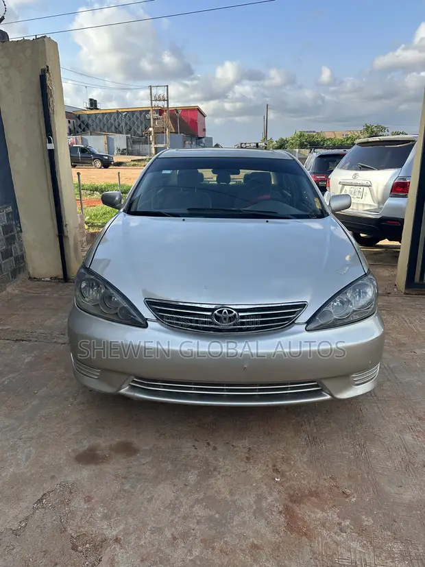 Toyota Camry LE 2.4L Zinariya 2006 - 1