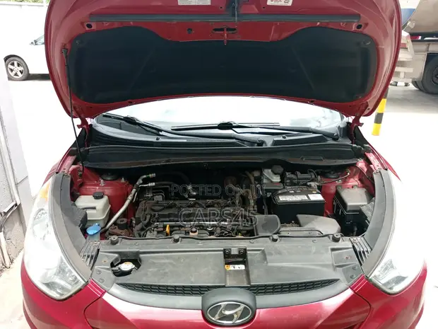 Hyundai Tucson 2013 Red - 1