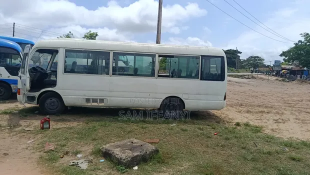 Toyota Coaster 2010 White - 1