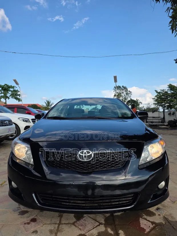 2010 Toyota Corolla LE - Black - 1