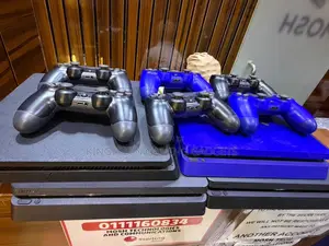 Used PS4 Slim Console with 2 Controllers & Games