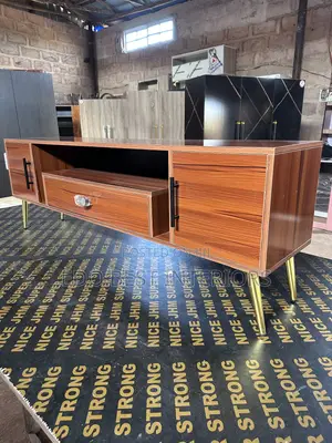 Brown TV Stand by Home Interiors
