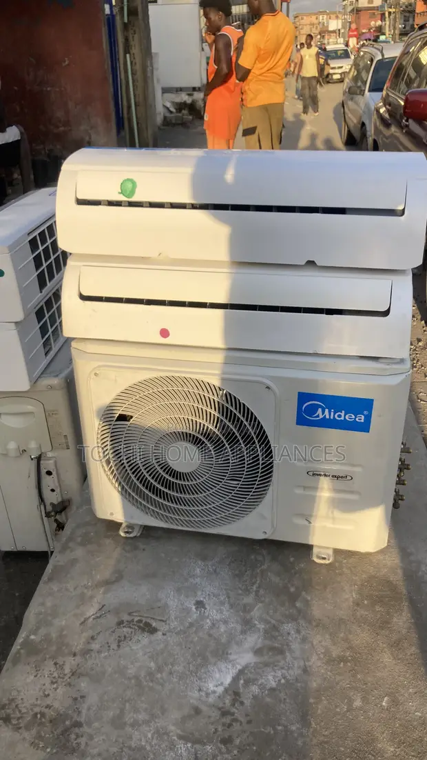 Midea 2-in-1 Inverter Air Conditioner - 1