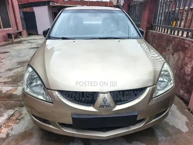 Mitsubishi Lancer 2004 Zinariya - 1