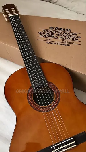 Barely Used Yamaha 38" Brown Acoustic Guitar with Bag