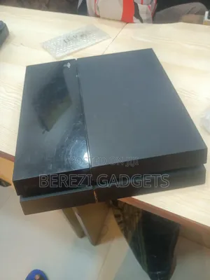 Used Sony PlayStation 4 Fat Console with Games