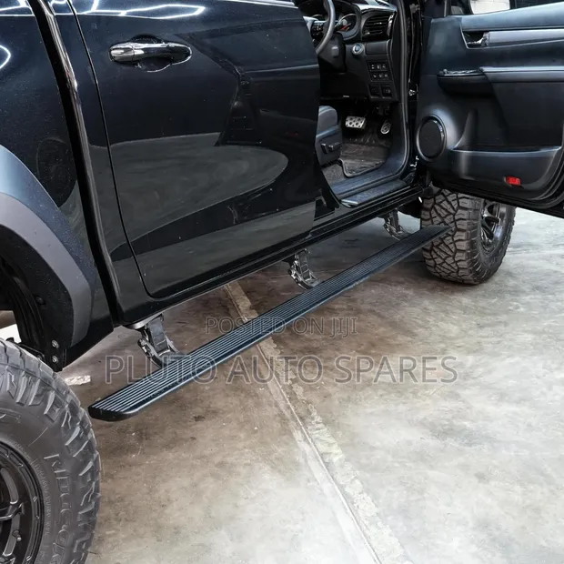 Automatic Foldable Electric Side Steps for Toyota Hilux - 1