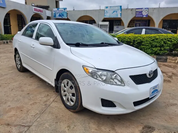 Toyota Corolla 1.8 Exclusive Automatic 2009 White - 1