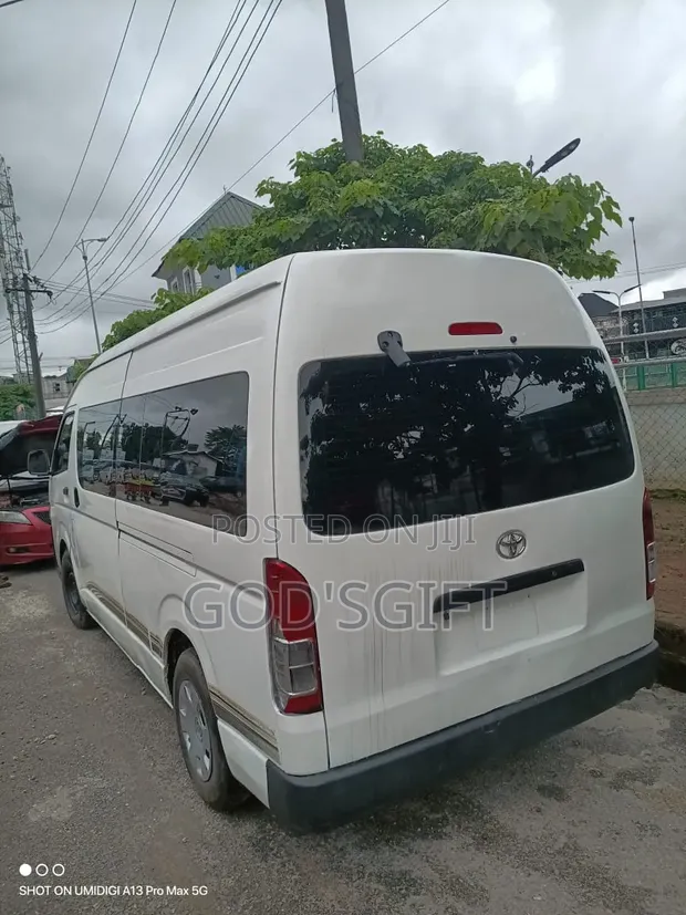 Toyota Coaster 2014 White - 1