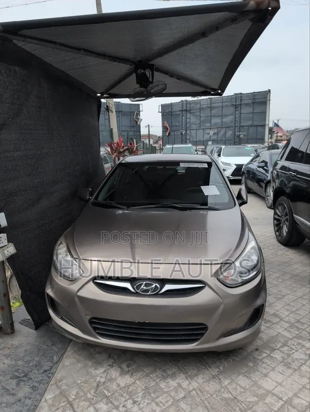 Hyundai Accent 2011 Brown - 1