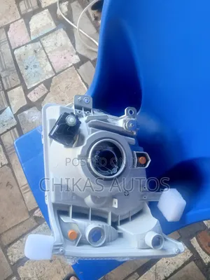 Daihatsu Hijet Headlamp Pair & Covers - Brand New
