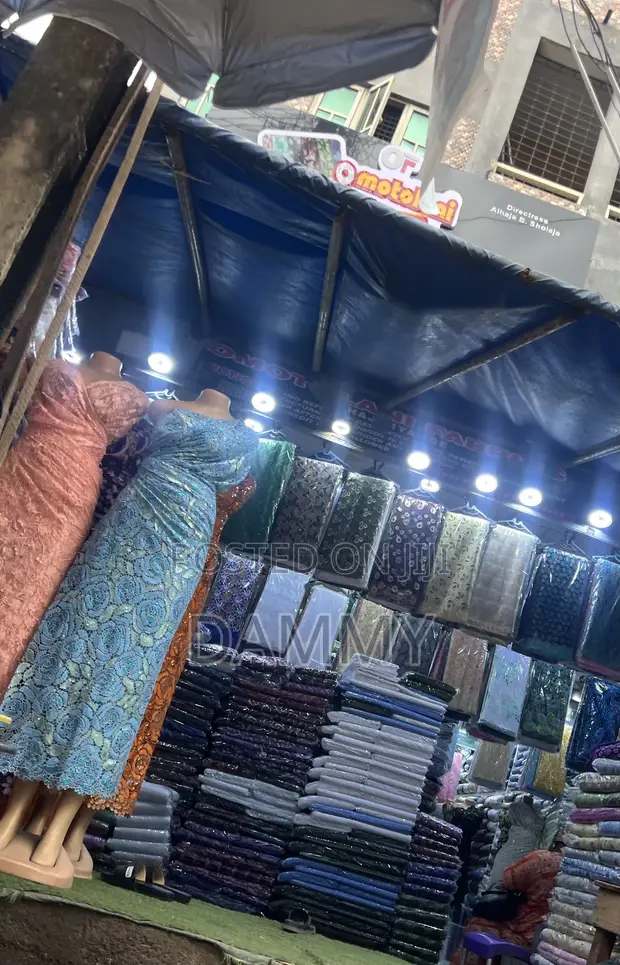 Vibrant Outdoor Fabric Stall - 1
