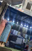 Vibrant Outdoor Fabric Stall - 1