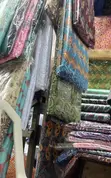 Vibrant Outdoor Fabric Stall - 1