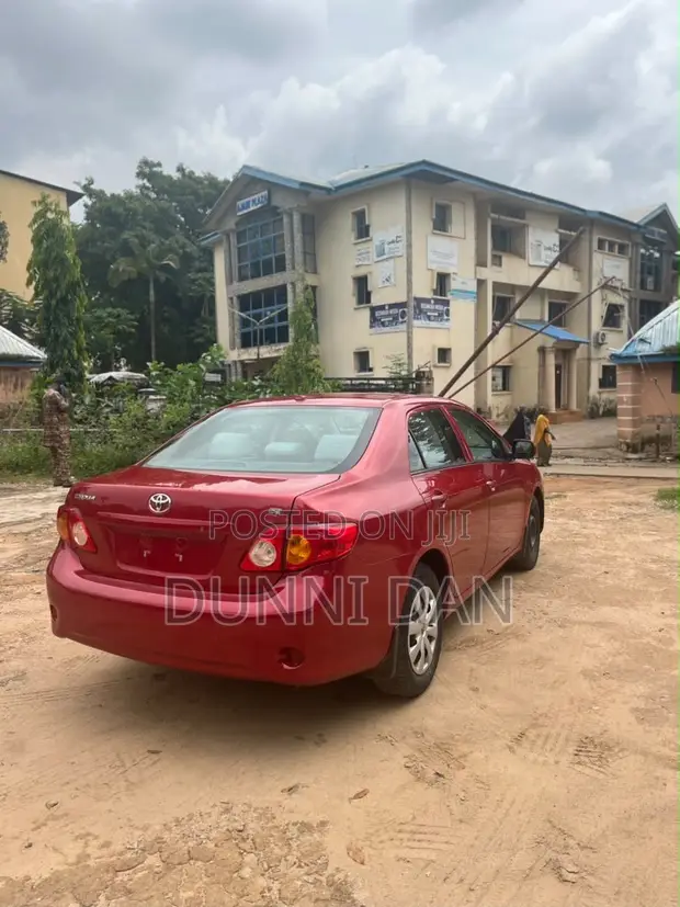 2010 Toyota Corolla Base Sedan - Red - 1