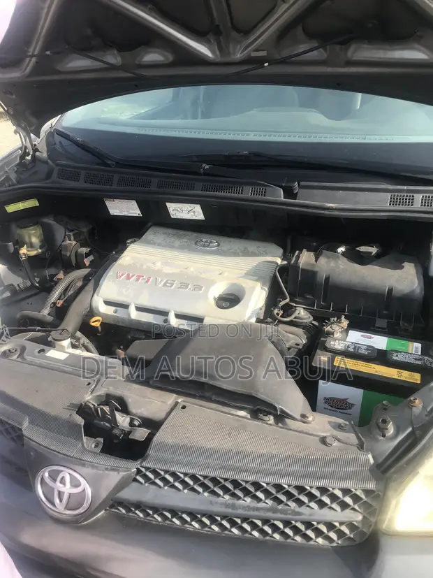Toyota Sienna 2005 Maroon - 1